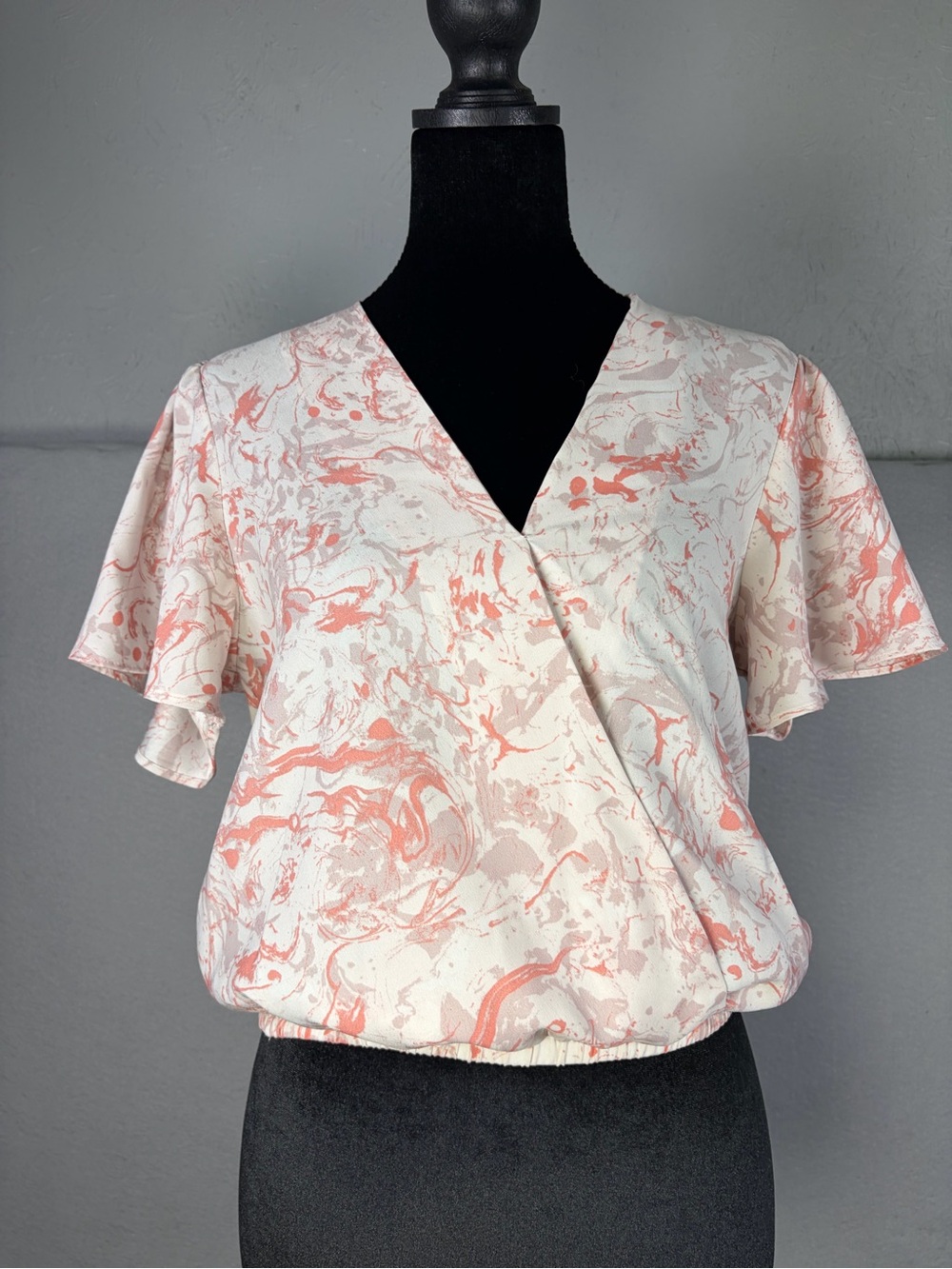 Astr Peach Marble Wrap-Style Blouse with Flutter Sleeves
